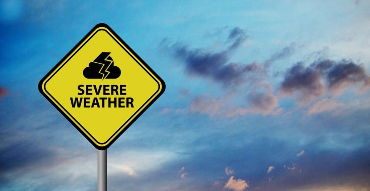A sign that reads Severe Weather, storm damage concept