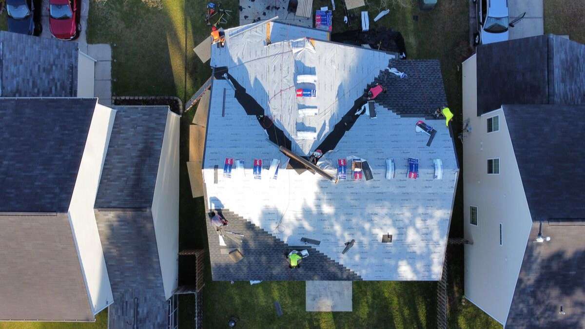 Aerial shot of a residential roof during a roof repair by the best roofers in Charleston, SC