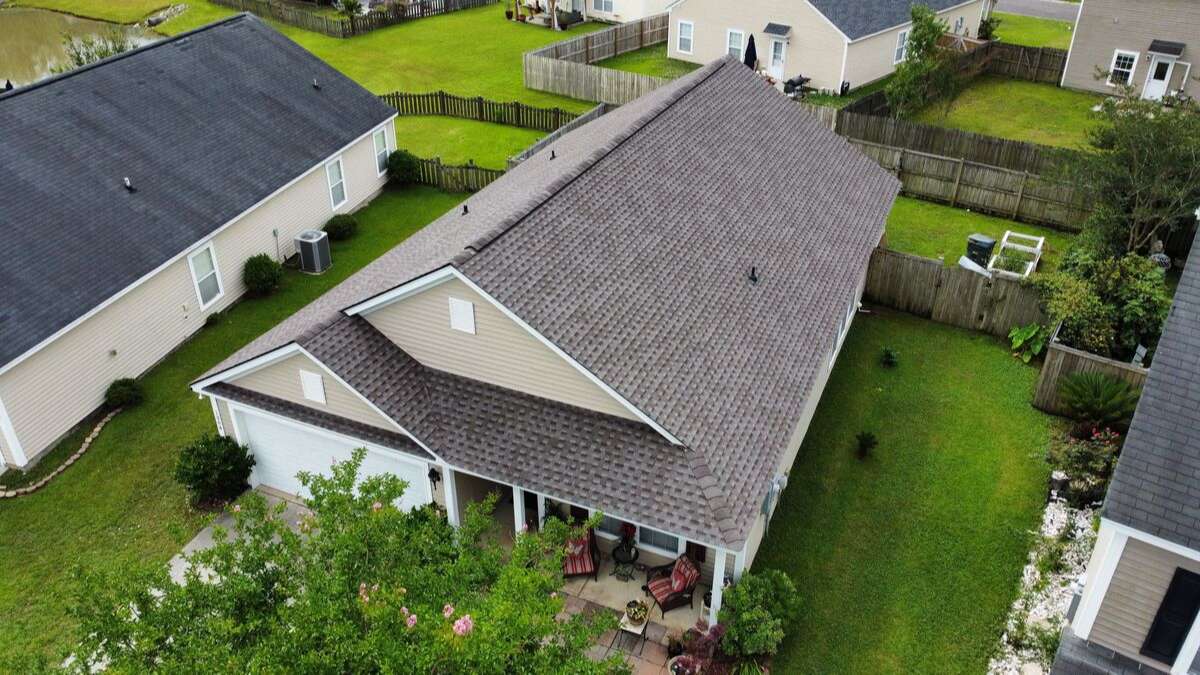 An asphalt shingle roof completed by one of the best roofing companies Charleston, SC, offers