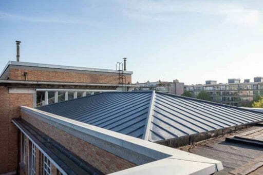 Metal roofing repairs contractors concept. 