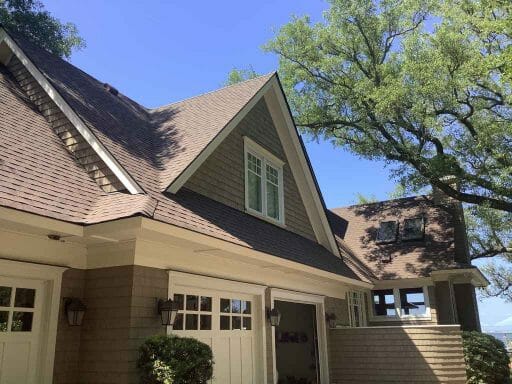 A home with new roof, Charleston, SC asphalt shingle roofing experts concept.