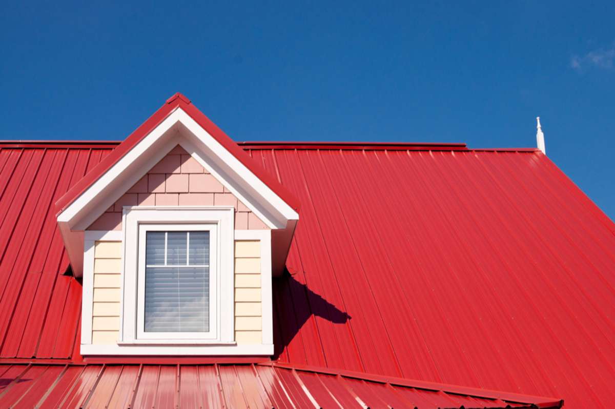 Dormer window on red roof