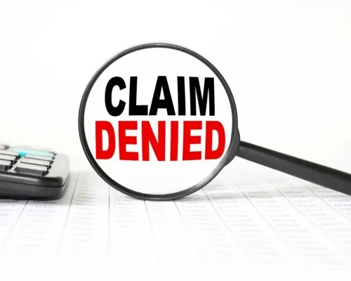 Claim_Denied_highlighted_by_magnifying_glass,_what_to_do_if_insurance_denied_roof_claim_concept