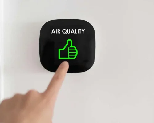 Finger_pointing_to_a_button_that_says_air_quality_with_a_green_thumbs_up