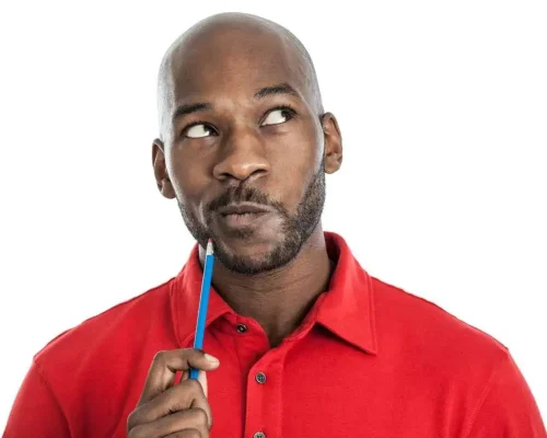 Man_thinking_in_a_red_shirt_about_when_he_needs_an_itemized_roofing_estimate